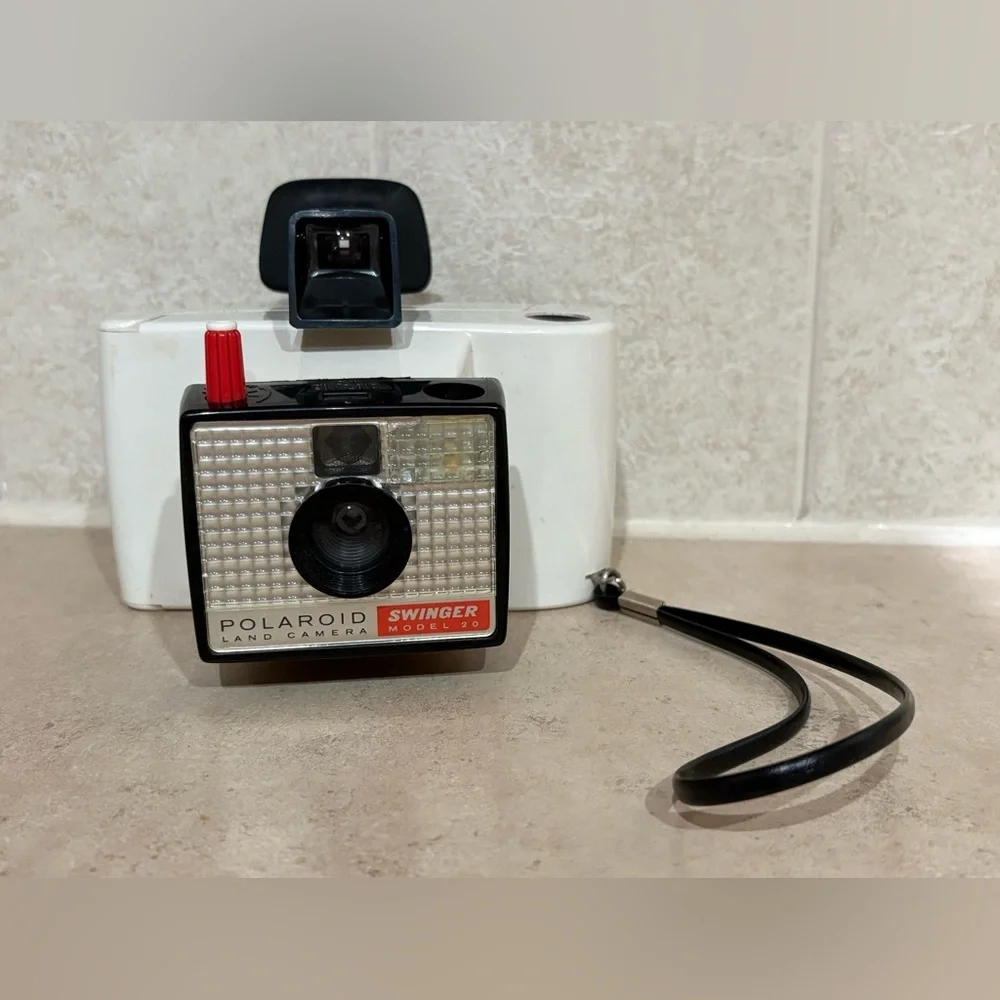 Vintage Polaroid Swinger camera and case